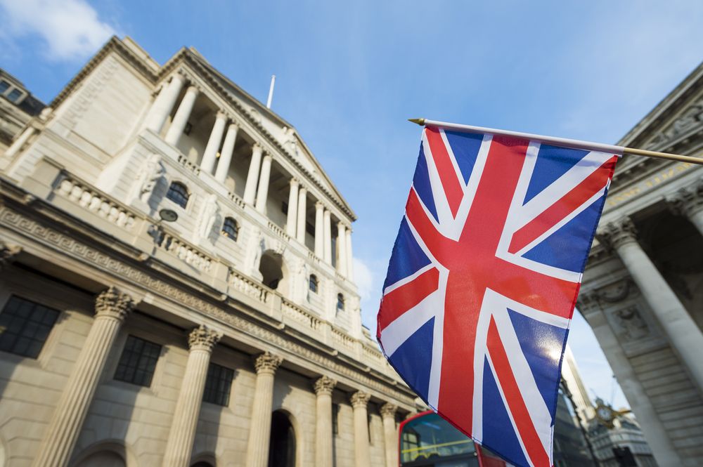 British Union flag flying in front of the Bank of England in the City of London financial center