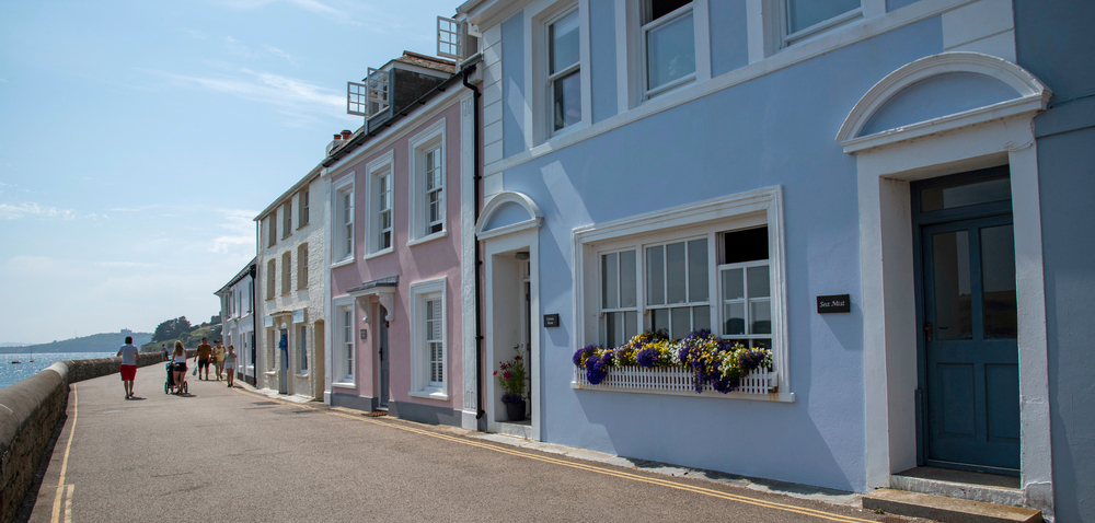 St Mawes, Cornwall, England, UK. 2021. Pastel painted cottages on the seafront at St Mawes a popular Cornish holiday resort, U